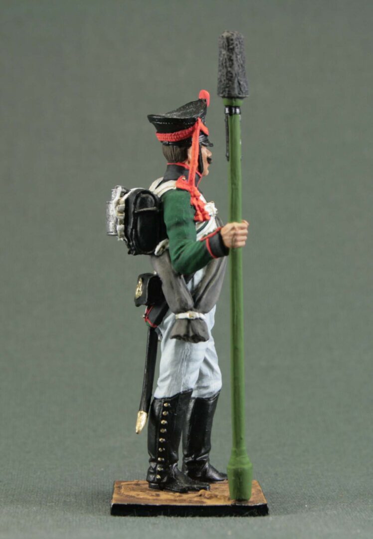 Side view of hand-painted Russian artillery gunner.