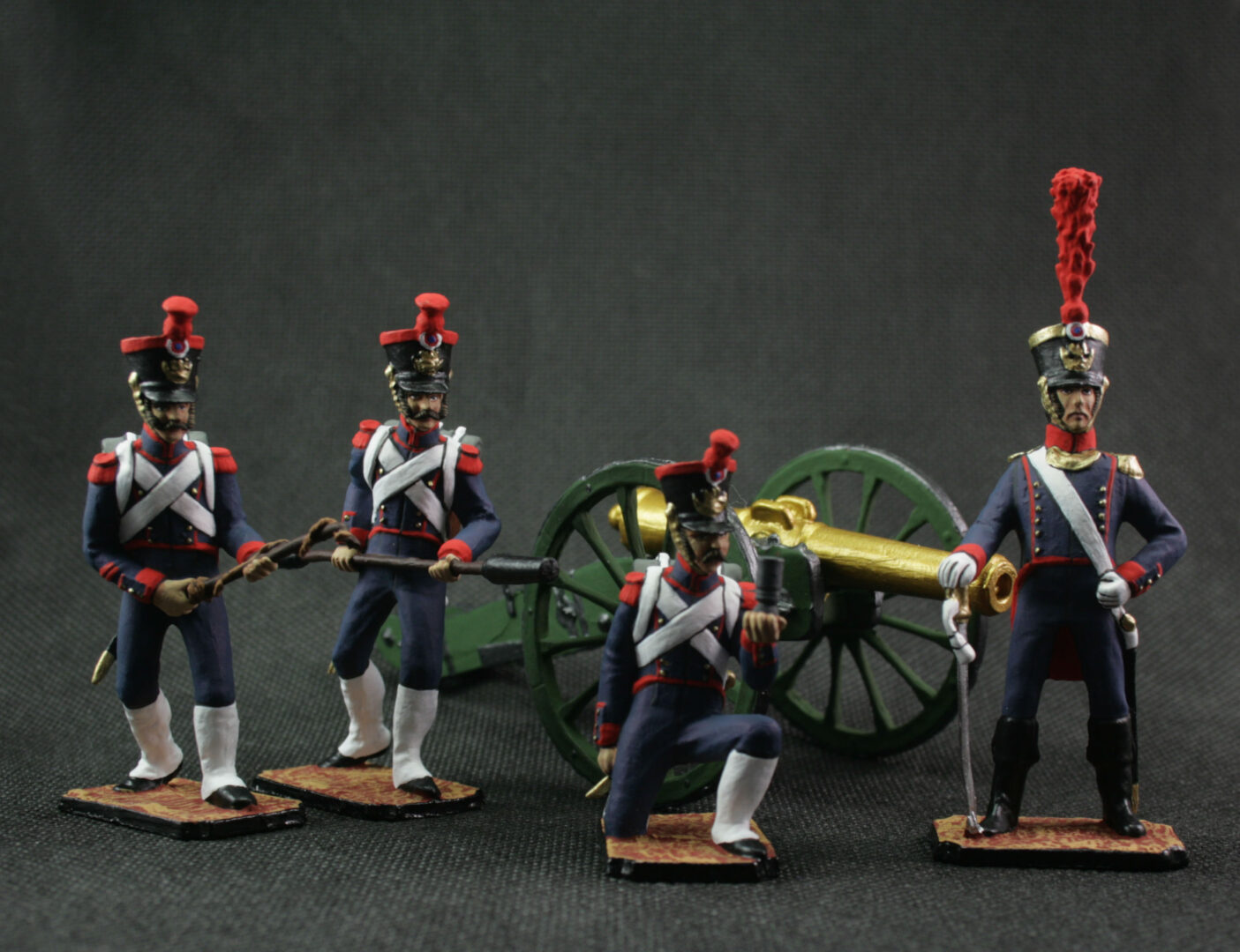 Hand-painted 54 mm Napoleonic tin soldier set with five French Foot Artillery figures and cannon, France 1812